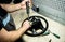 Car mechanic repair steering wheel at service station. Car repair service
