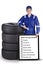 Car mechanic and tyres with tips on board