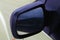 Car mirror. Black auto mirror. Rearview car driving mirror view house.