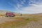 Car and motorbike on road in the desert mountain of the Mongolia