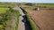 The car is moving on a country road. Outside the city through the fields. timelapse.