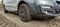 Car in the mud. dirt wheel offroad road after rain