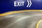 Car park exit sign with directional arrow