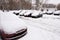 Car parking in city yard in winter season