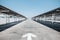 Car Parking Lot Area on Deck Floor of Shopping Mall, Perspective View Empty of Car Park Structure Building at Department Store.