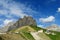 Car parking in the mountains near refugio, restaurant in the Alps