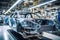 Car production line. Assembling a car on a conveyor belt. Close-up of a car body. Automotive industry Interior of a high-tech