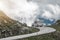 Car Pulling Travel Trailer on the Scenic Alpine Road