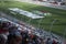 Car racing and fans close up in the time of the famous car racing at speedway.