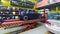 A car raised on a lifter for repairing the chassis and engine in a repair shop - service station - Mini Cooper