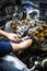 Car repair: overhaul of the V6 engine with detailed pulleys and parts