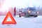 car repair on the road in winter. Car triangle on winter road. Problem with vehicle on snowy road. Broken cars concept. banner of