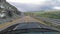 Car ride Point Of View, The Majestic Transalpina Mountain Road in Romania With A Black sport Car Bonnet In The