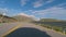 Car ride Point Of View, The Majestic Transalpina Mountain Road in Romania With A Black sport Car Bonnet In The