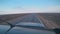 Car rides on a road in the desert, view from the roof