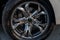 Car rims detail, part of vehicle wheel with disc brake, automobile industry, extreme auto sport concept, selective focus