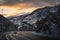 Car on the road leading to El Tarter village after dusk, Andorra