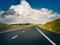 Car road under beautiful solar sky