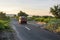 Car on the rural sunny road