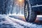 Car\\\'s wheels on slippery road covered with snow. Danger on winter trip. Generative AI