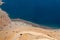 Car on the sand road at Fjord Khor Najd in Oman