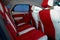 Car seats. Car interior details. White red leather with stitching