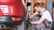 Car service, repair, maintenance of new cars - a European car mechanic man.