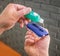 Car service worker applying nano coating on a car detail close-up.