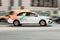 Car-sharing delimobil car Volkswagen Polo in motion on Moscow street