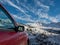 Car in a snowdrift in a dead end on a road piled with snow