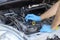 Car spark plug and ignition coil change or replacement. Repairing of vehicle engine.