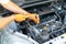 Car spark plug replacement. Repairing of vehicle