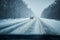 Car in storm on a winter road with traffic. Danger driving in winter. First person view
