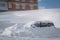 Car stuck in heavy snowbank