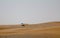 A car SUV off-roading in the deserts of Dubai, UAE