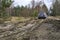 Car on swamp dirt road. Off road trip