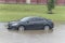 Car swamped by hurricane flood water in East Houston, Texas, USA