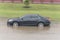 Car swamped by hurricane flood water in East Houston, Texas, USA