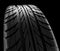 Car tires close-up Winter wheel profile structure on black background - 3d rendering