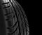 Car tires close-up Winter wheel profile structure on black background - 3d rendering