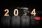 Car tires, winter wheels, isolated new tyres, happy new year 2024 black background