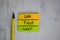 Car Title Loan write on sticky notes isolated on Wooden Table