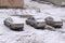 Car almost totally buried under a snow after a blizzard during the night at the alpin ski station .