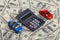 Car toys and calculator among the dollars