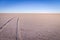 Car tracks on salt lake at Salar de Uyuni, Bolivia