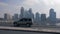 Car traffic on modern city highway in Sharjah UAE slow motion