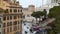 Car traffic and people crowd near Venice square Piazza Venezia and Capitoline Hill