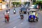 Car traffic on the road in Bangkok day tuk-tuk taxi tricycle, motorcycles, cars, Rama i road.