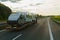 A car transporter transports new motorhome trailers along the highway.