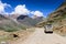 A car travel along the road on Manali-Leh highway in Ladakh, Himachal Pradesh, India